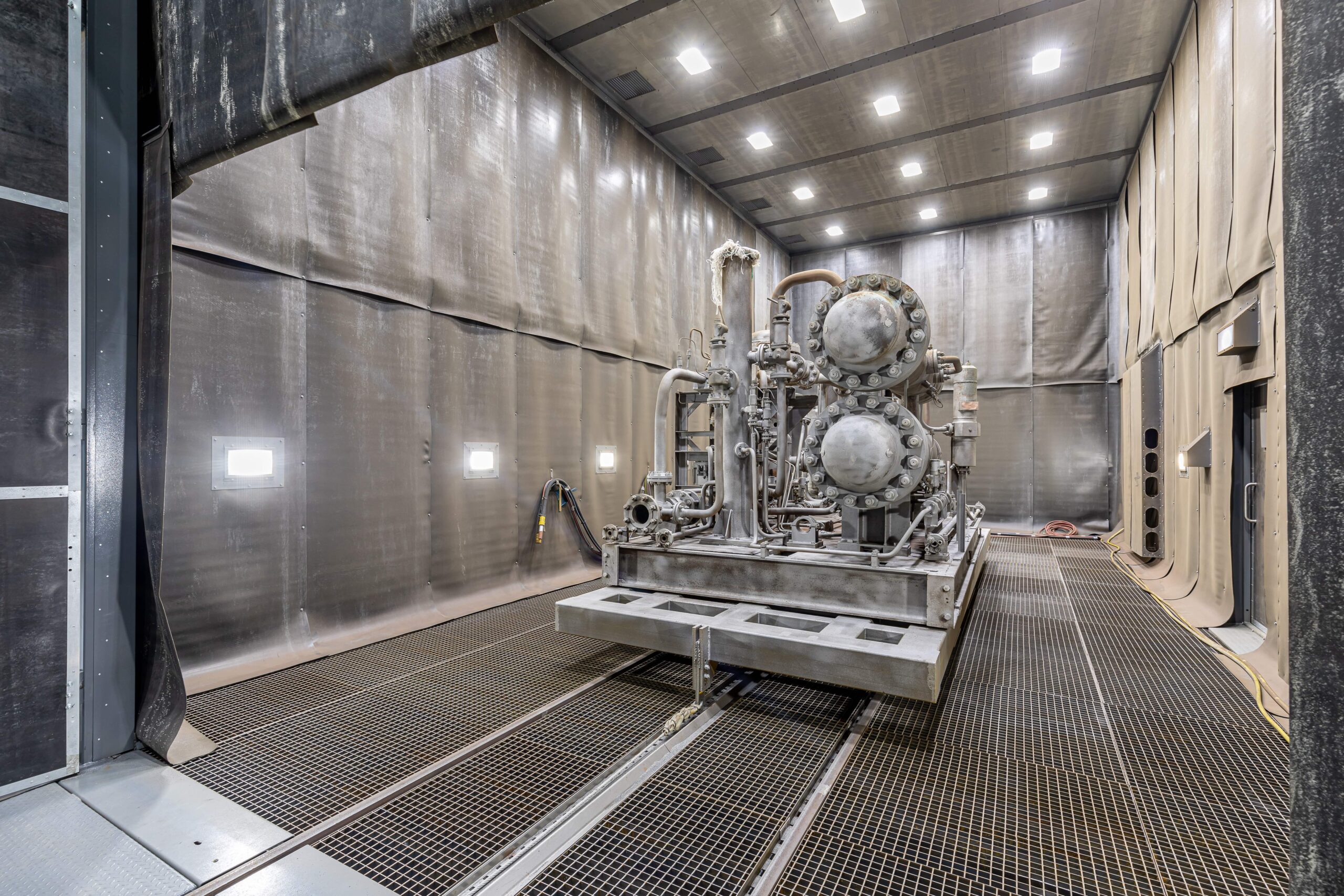 Inside an abrasive blasting workshop, representing the need for a dist collector and fume extractor.